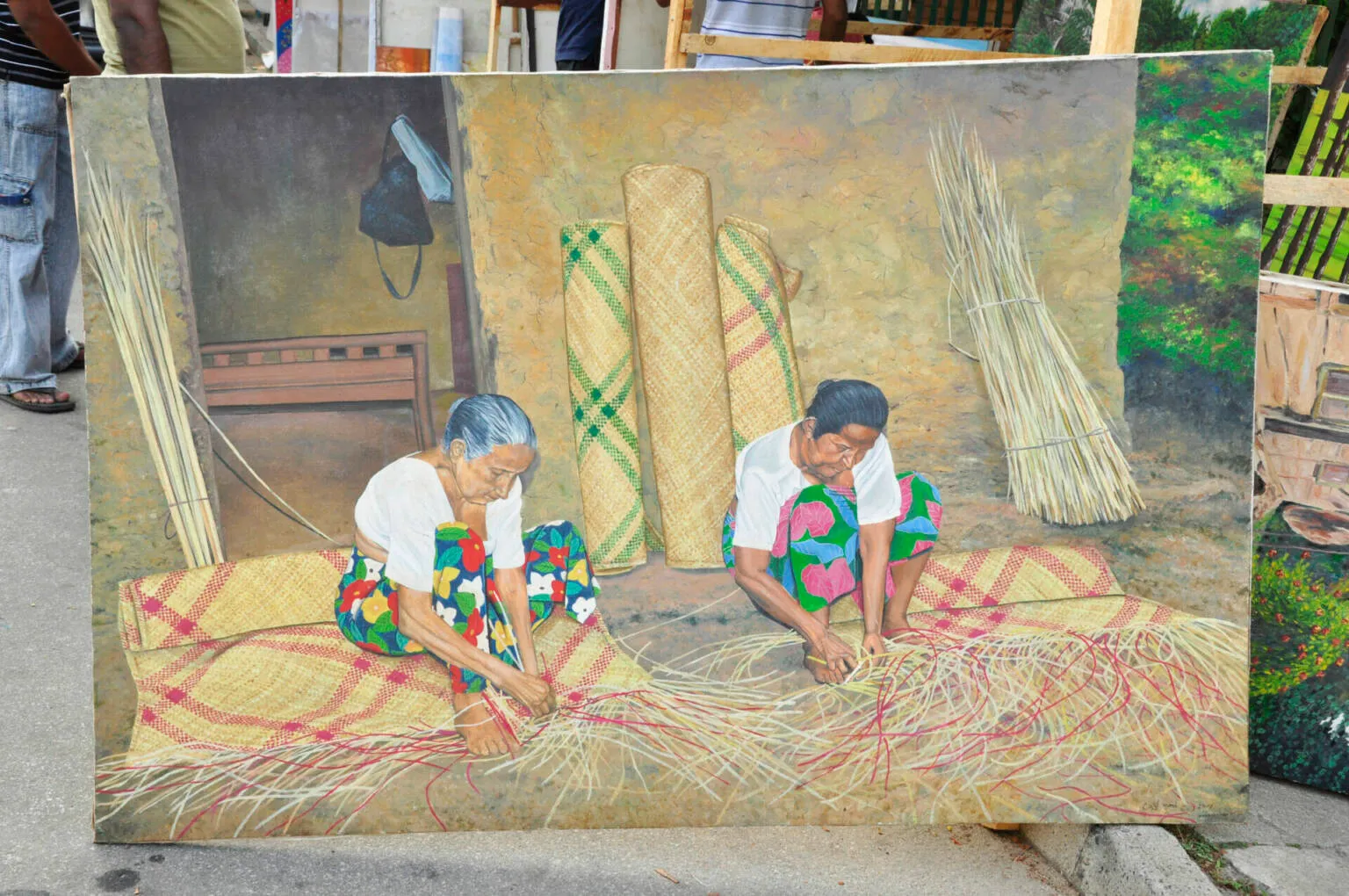 A painting depicting two women skillfully crafting straw hats, showcasing their artistry and traditional craftsmanship.